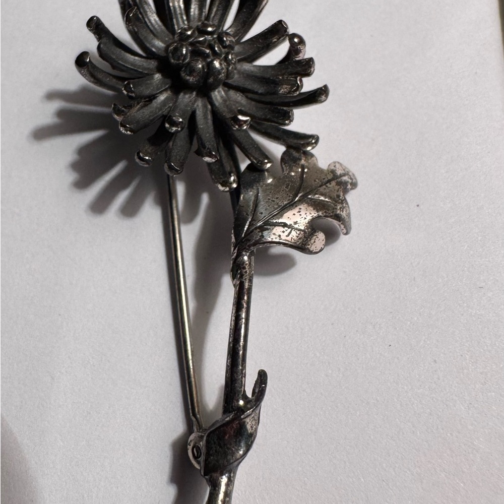 Elegant Silver Floral Brooch